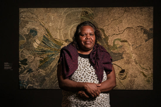 Denise Brady in front of her work 'Look, I Am Shrinking'', Tarnanthi Festival 2023